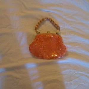 Orange sequin purse